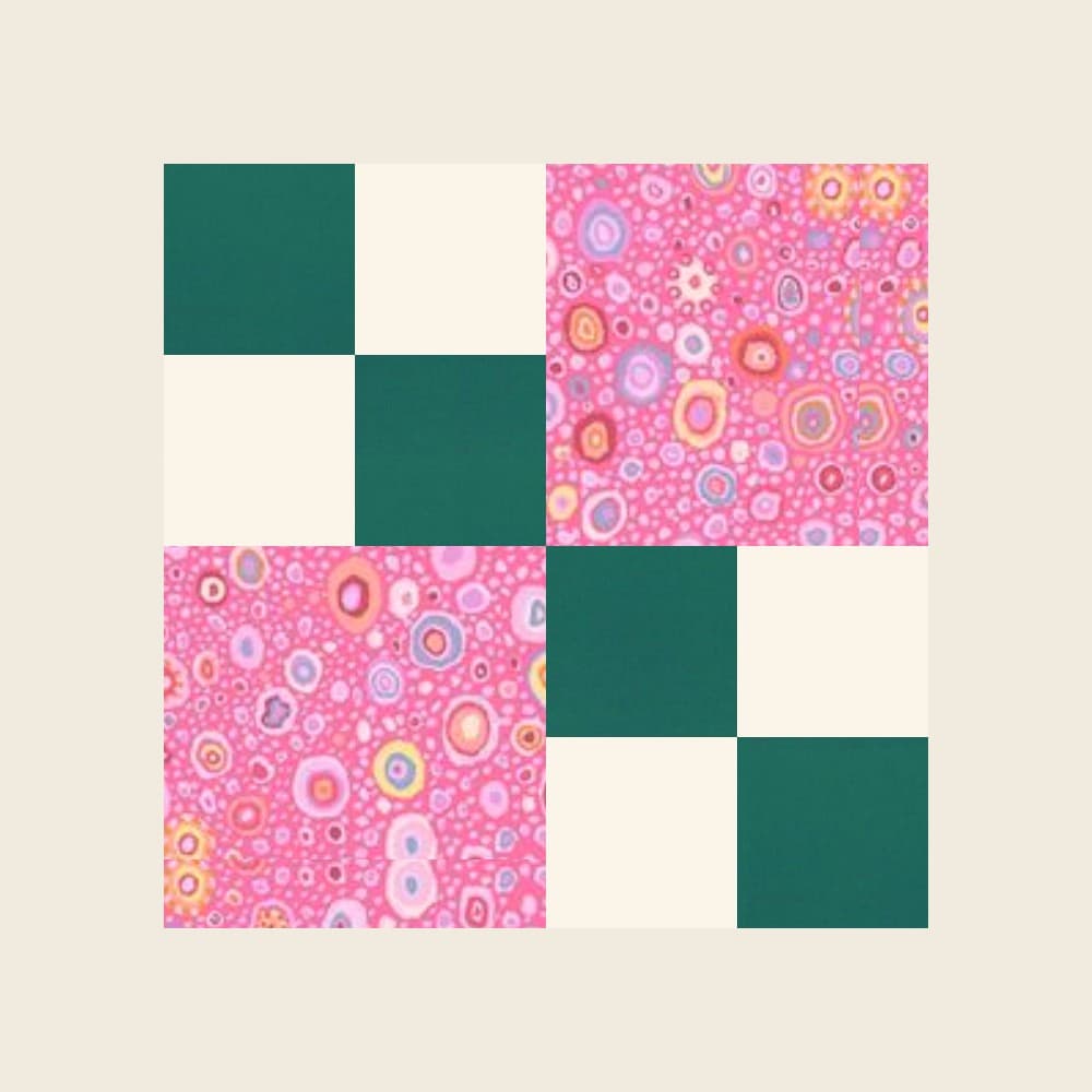Rosewater Check's block preview: two pink print squares and two teal-and-ivory four-patches